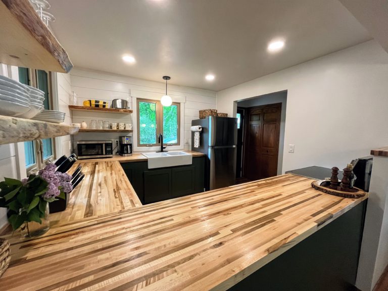 Stocked kitchen with butcher block counter tops