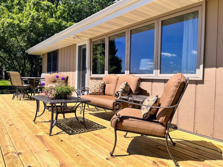 New lakeside deck with patio furniture